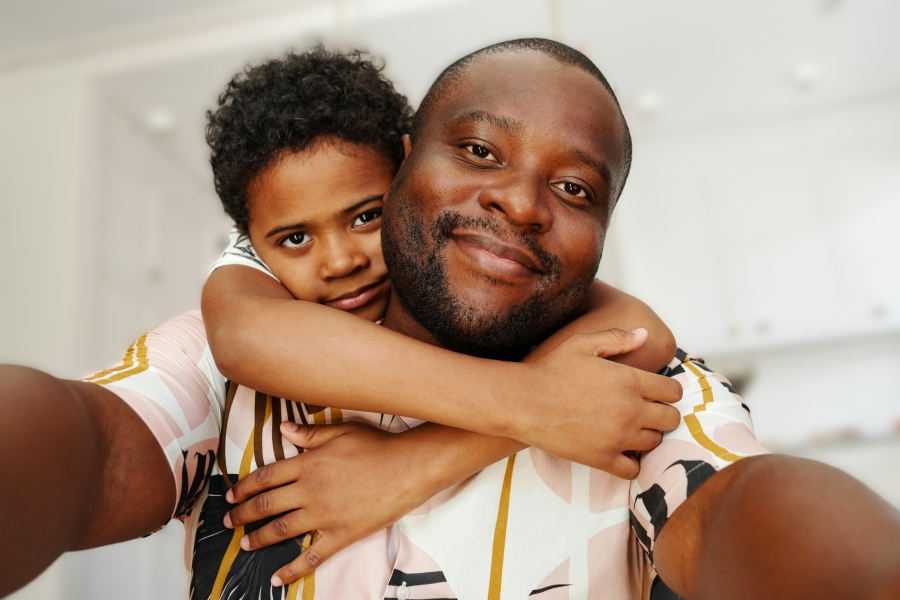 son hugging his dad